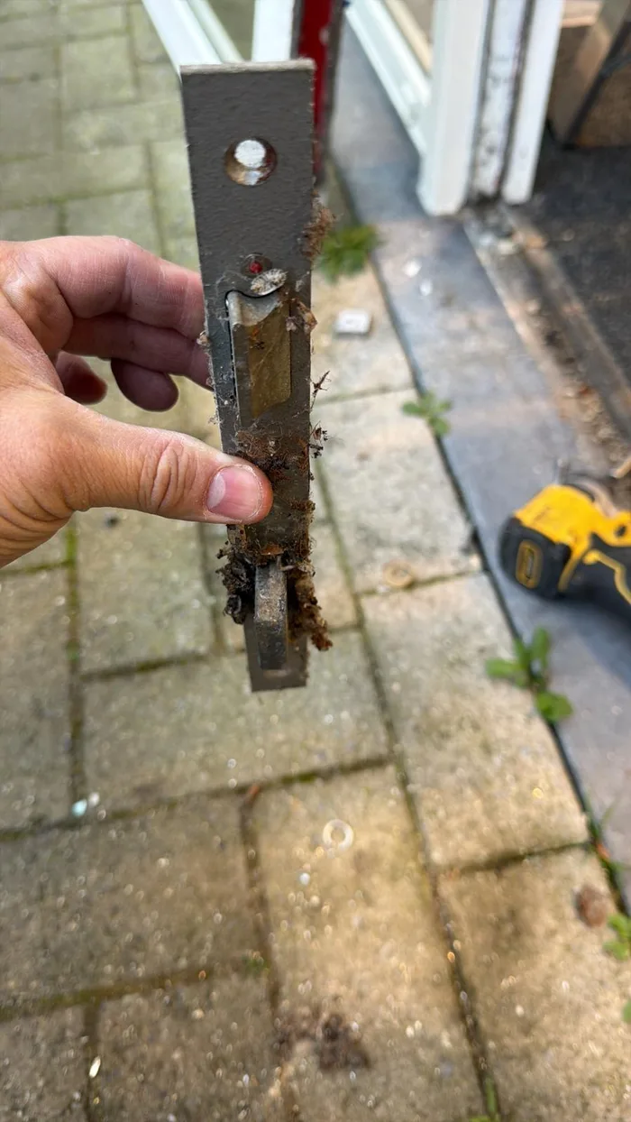 Accredited Lockstead locksmith repairing home security locks in Peckham
